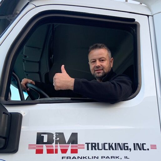 Friendly truck driver in R&M cab giving a thumbs up Friendly truck driver in R&M cab giving a thumbs up
